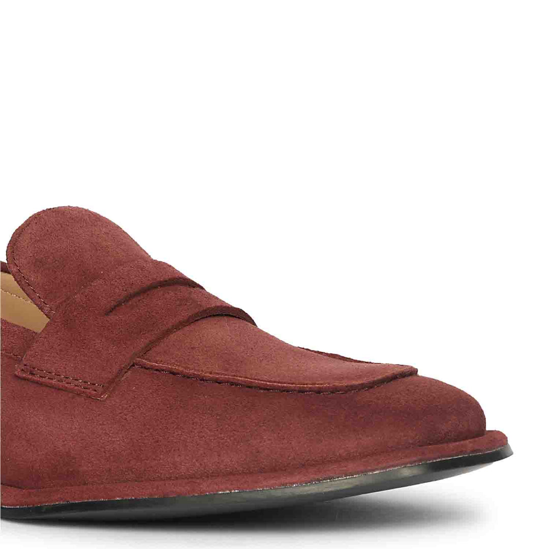 Close-up of saddle strap on Saint Carla burgundy suede loafers UK
