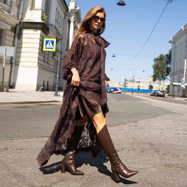Women's brown block heel knee high boots by Saint Celia, styled street-style lifestyle shot
