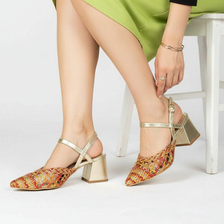 Low block heel shoes orange woven leather worn by model – lifestyle shot