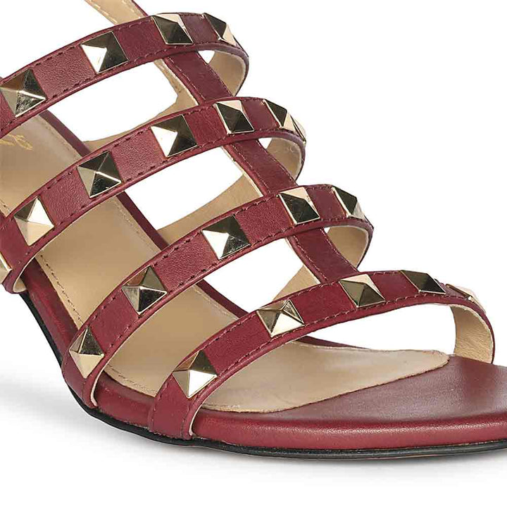 Close-up detail on Women's Saint Colette Rockstud Bordo Leather Stilettos