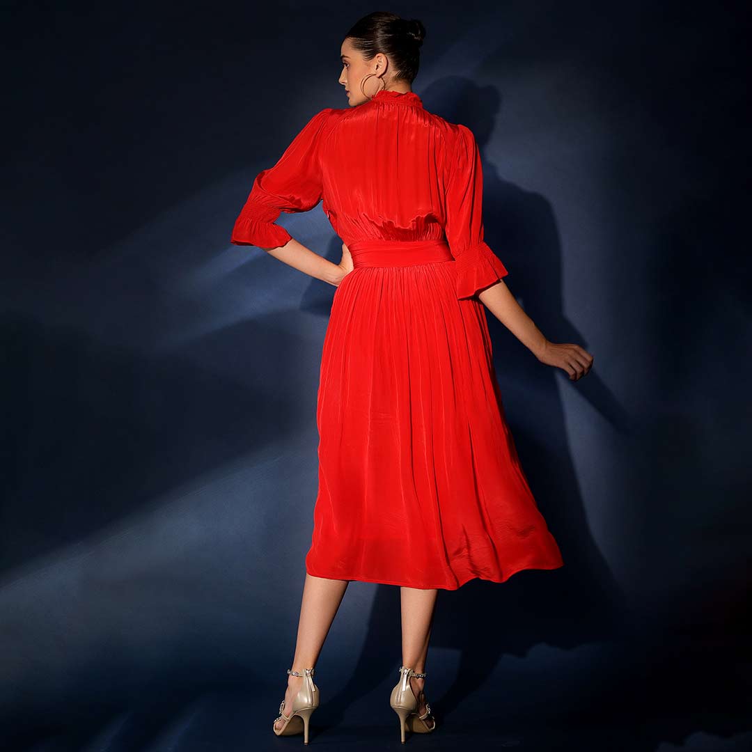 Women's crimson red solid viscose midi dress by Saint, back view.