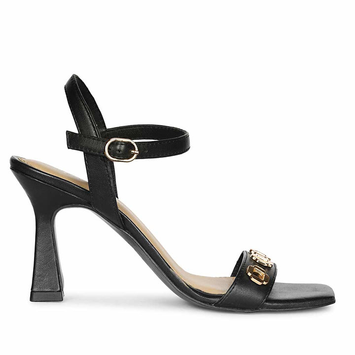 Saint Dahlia gold flower eyelets black leather heels, side view