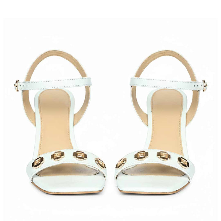 Saint Dahlia sky leather heels, front view of gold flower eyelets