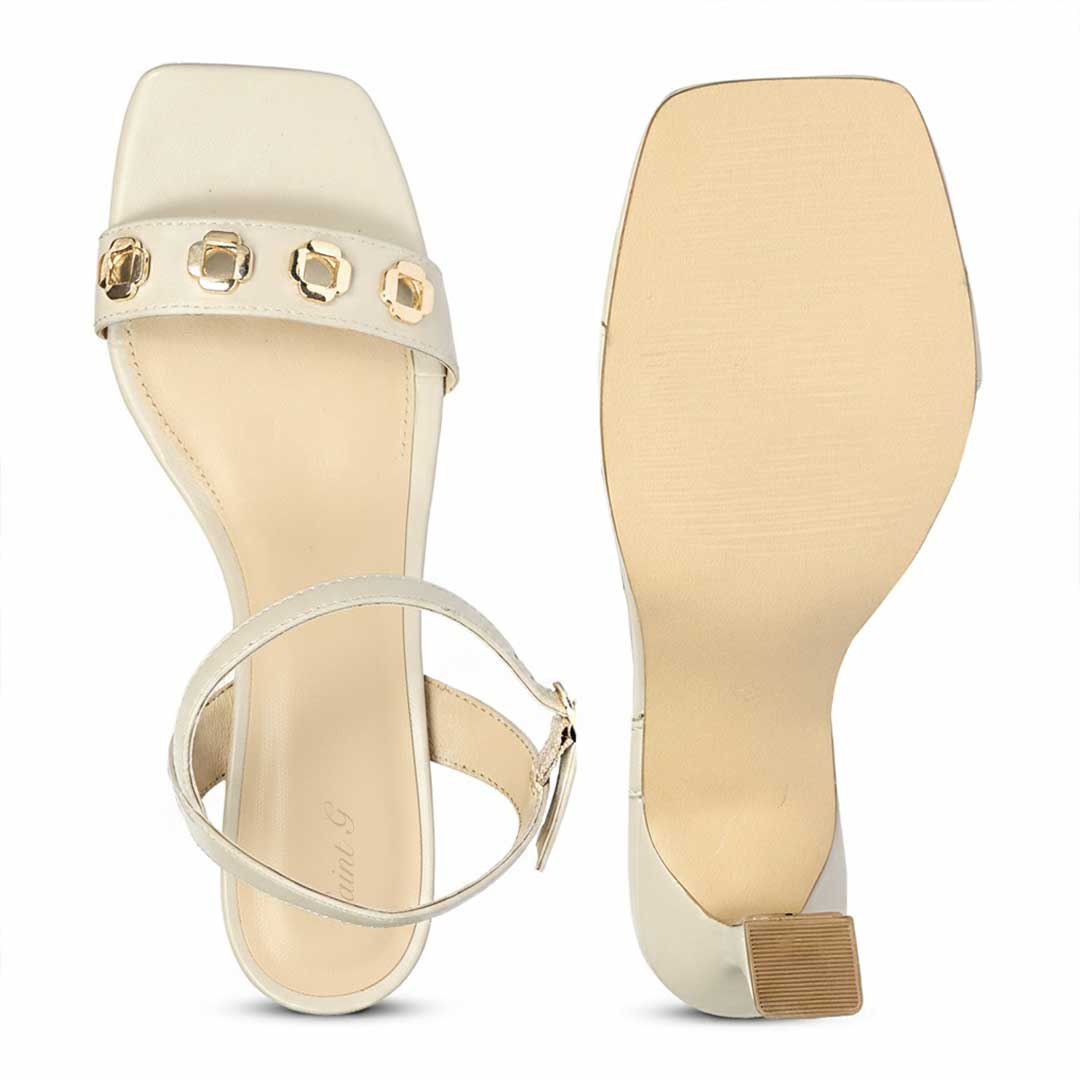 Close-up of gold flower eyelet detail on Saint Dahlia stone leather heels