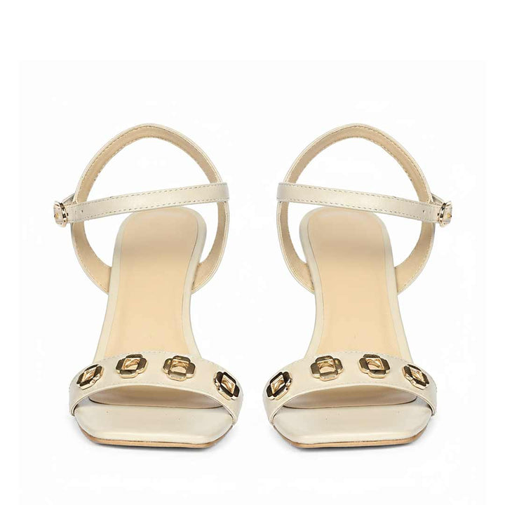 Saint Dahlia gold flower eyelets stone leather heels, front view