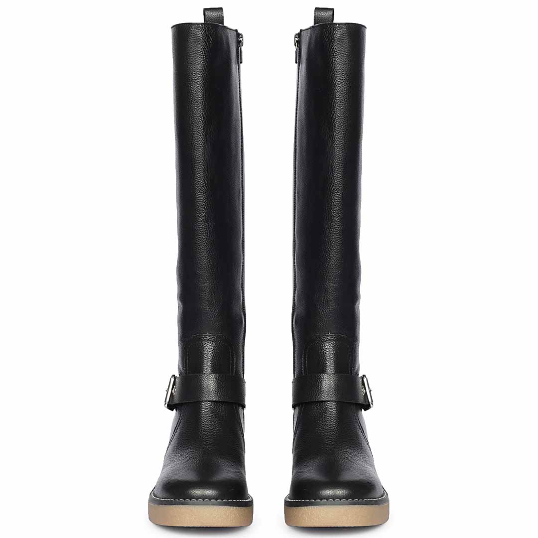 Women's Saint Dahlia black leather long boots, front pair view of silver buckle strap