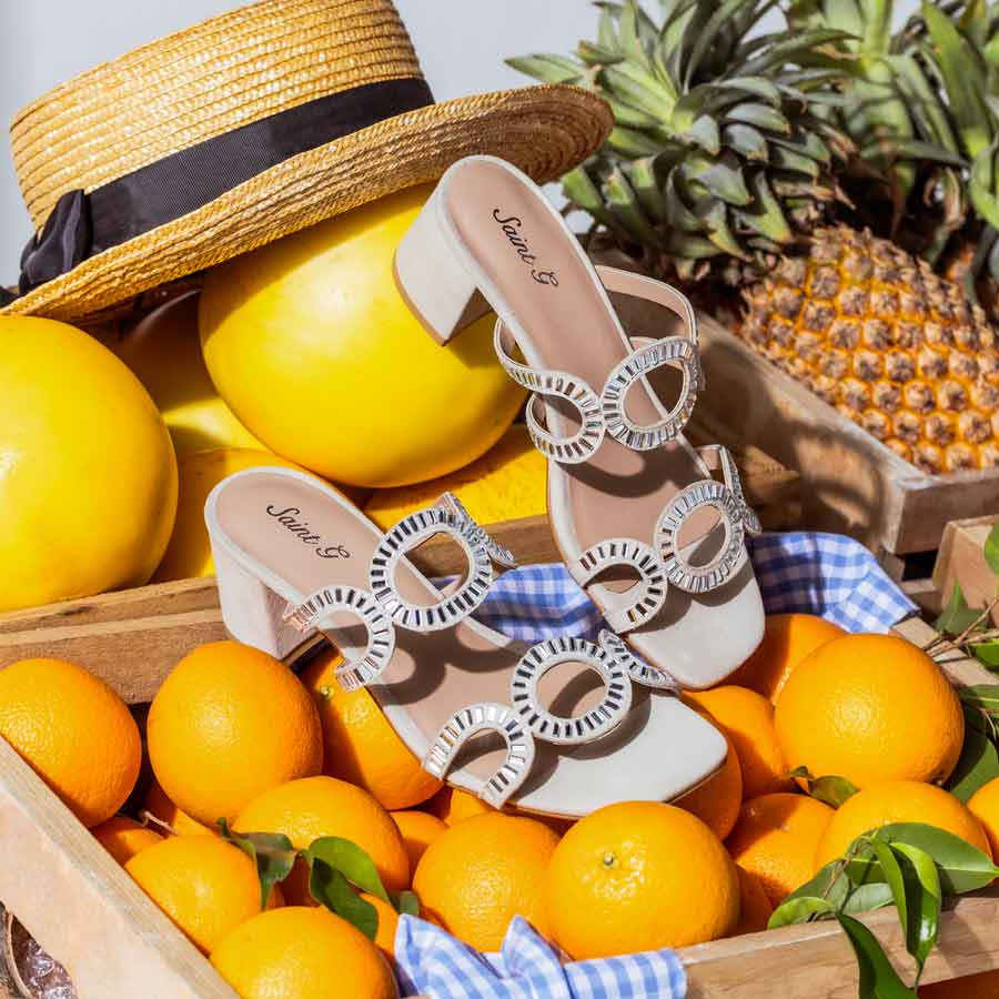 Beige low block heel shoes with crystal detail – pair angle view