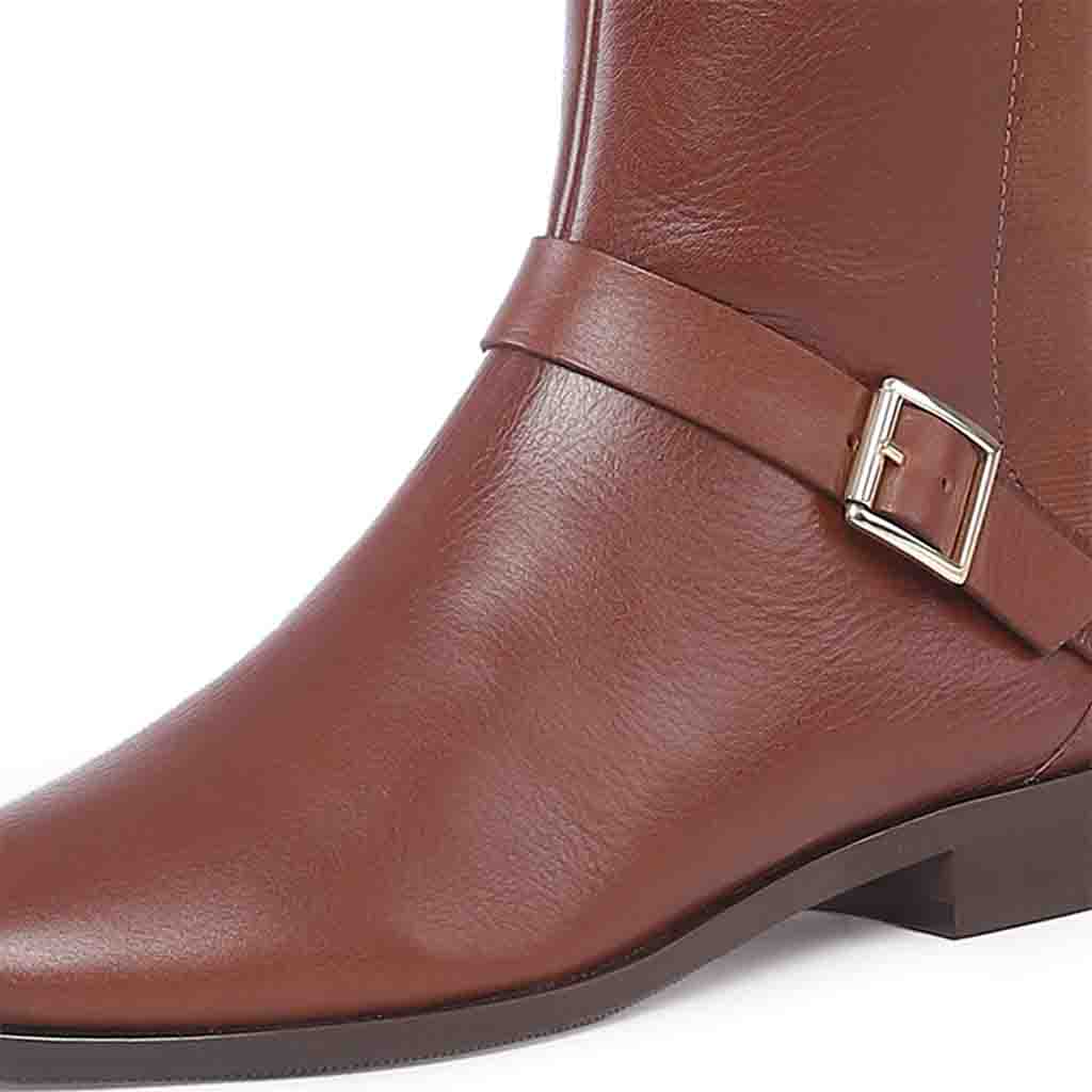 Close-up of gold buckle detail on Saint Delores tan leather knee high boots