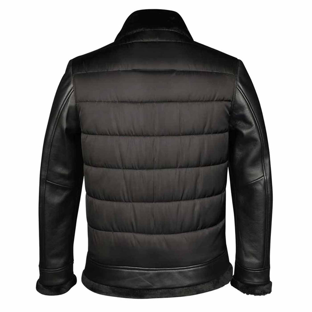 Full-length shot of a man wearing a black quilted jacket with a fur collar.