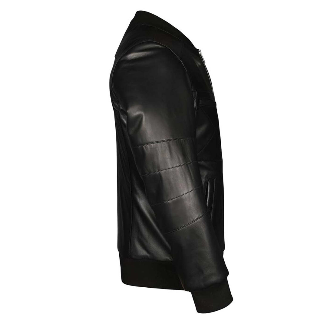 Close-up side view of a black leather bomber jacket's quilted sleeve panel.