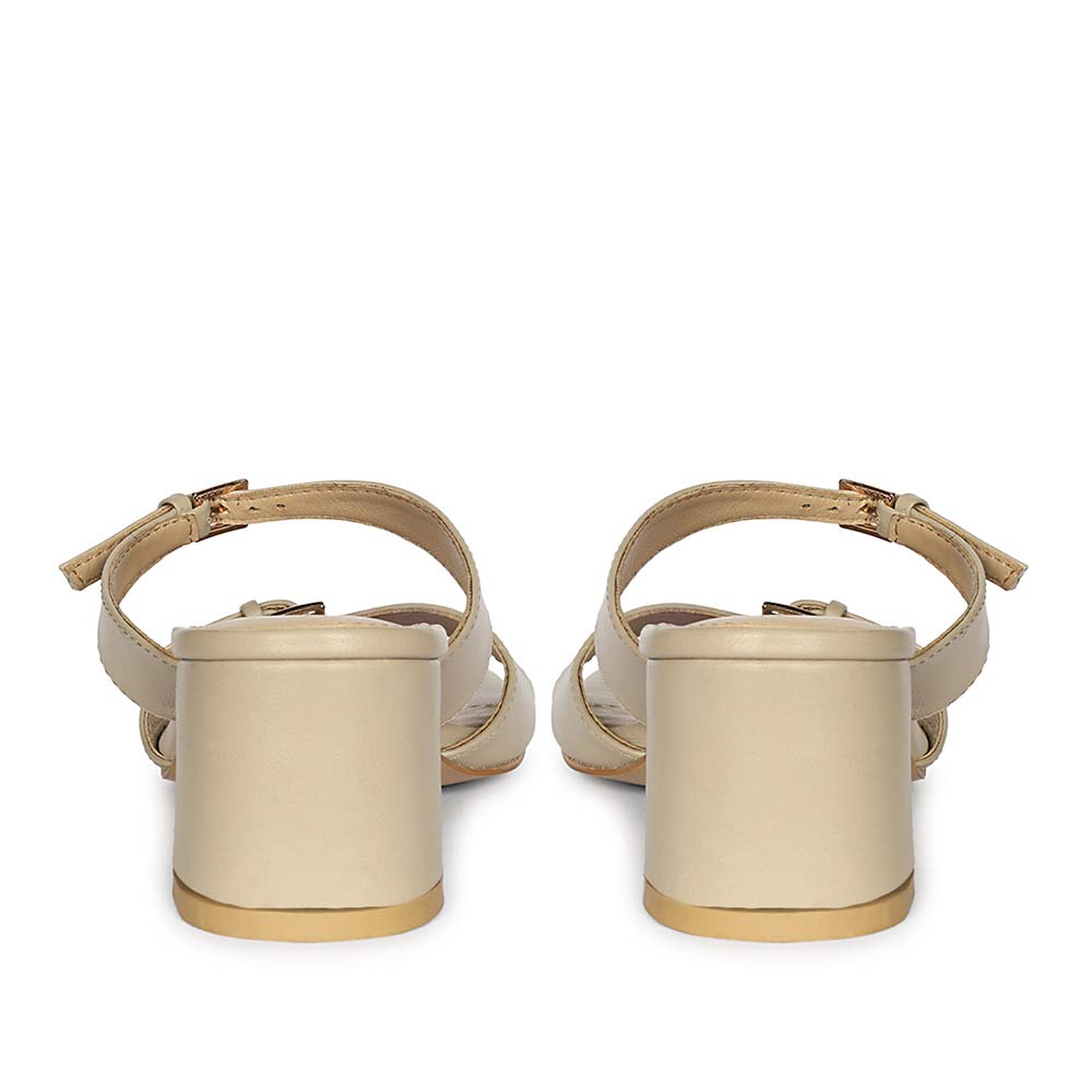 Back view of buckle detail on Saint Ellery beige leather low block heel sandals