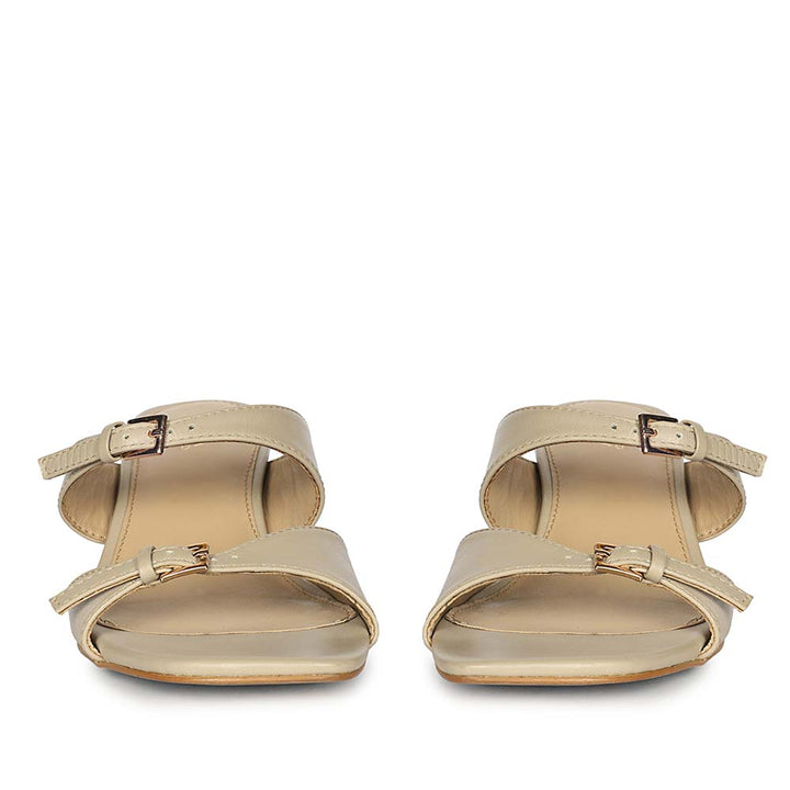 Saint Ellery beige leather low block heel sandals, front view of buckle straps
