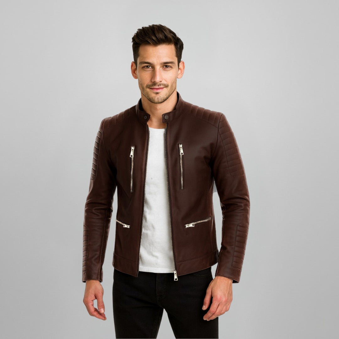 Man wearing an open brown leather jacket with quilted shoulder panels, front view.