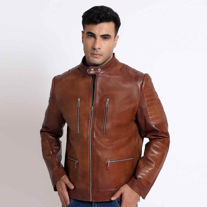 Man wearing an open tan/cognac brown leather cafe racer jacket.