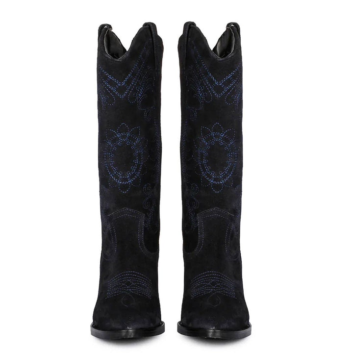 Women's cobalt suede cowboy boots, front pair view of scroll stitching