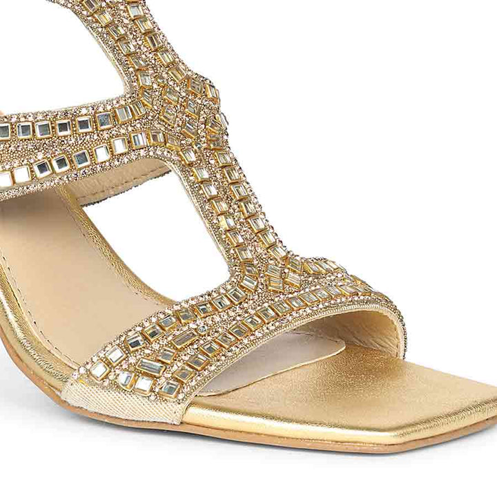 Close-up detail on Women's Saint Eloria Crystal Gold Leather Flared Stiletto Heels