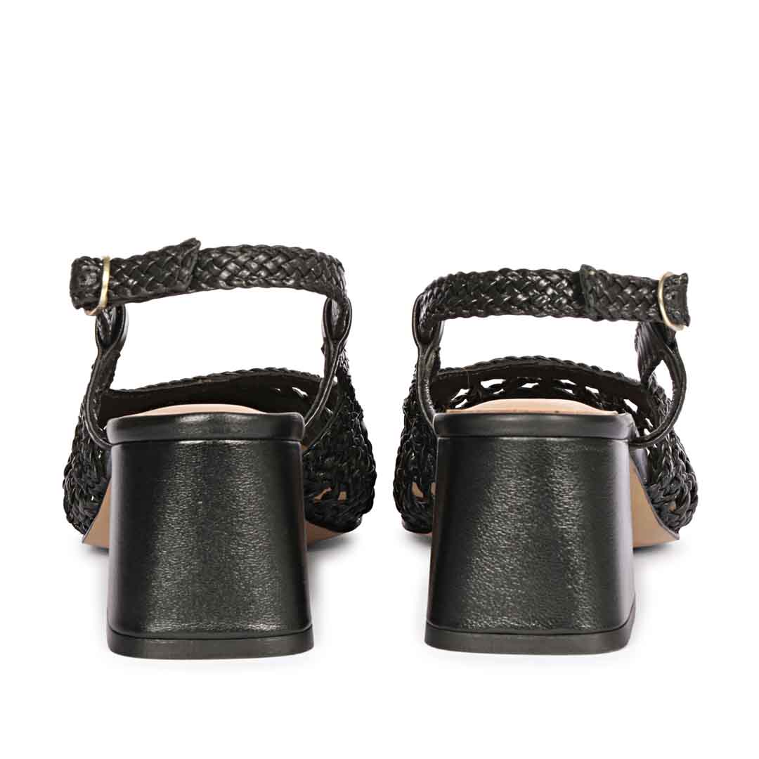 black low block heels woven leather texture sole – back view