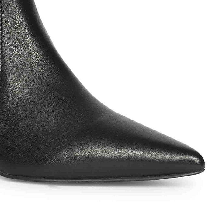 Close-up of pointed toe on Saint Emilia black stretch napa kitten heel boots