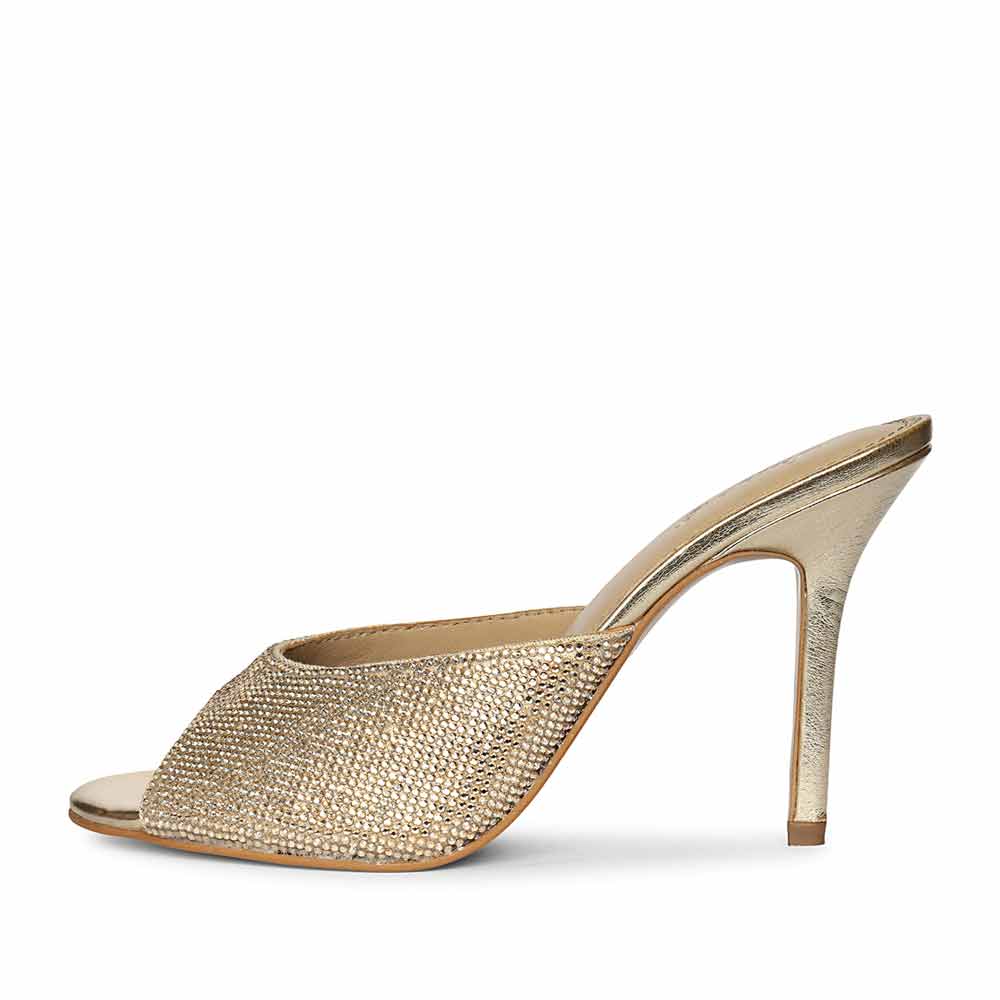 Saint Estrella glow crystal stiletto heels with iridescent crystal embellishment and ankle strap, left view