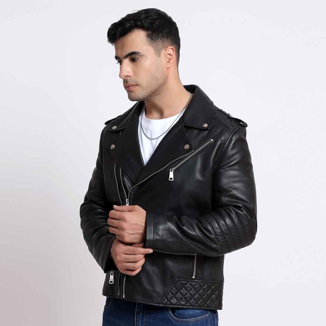 Side view of a man wearing a black leather biker jacket with an asymmetric zip.