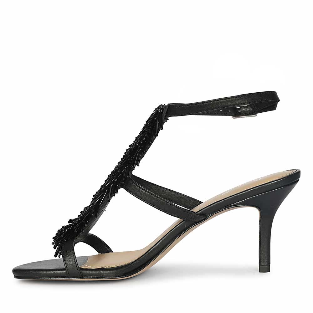 Women's Saint Faye Black Leather Fringe Stilettos, angled view