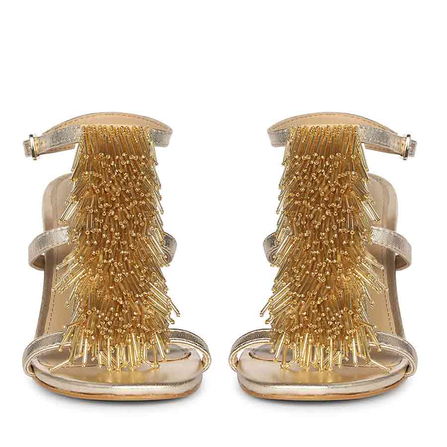 Women's Saint Faye Gold Leather Fringe Stilettos, front pair view