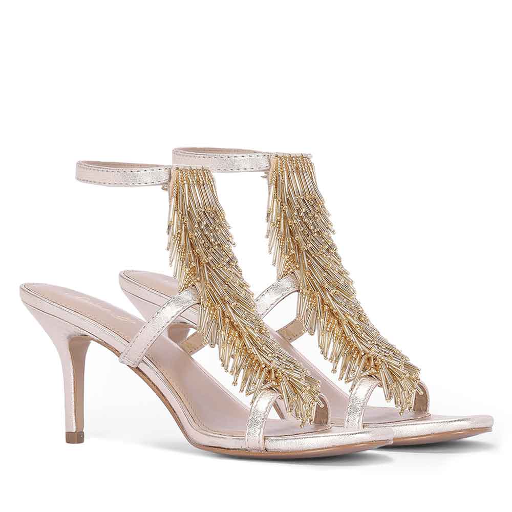 Women's Saint Faye Gold Leather Fringe Stilettos, pair view