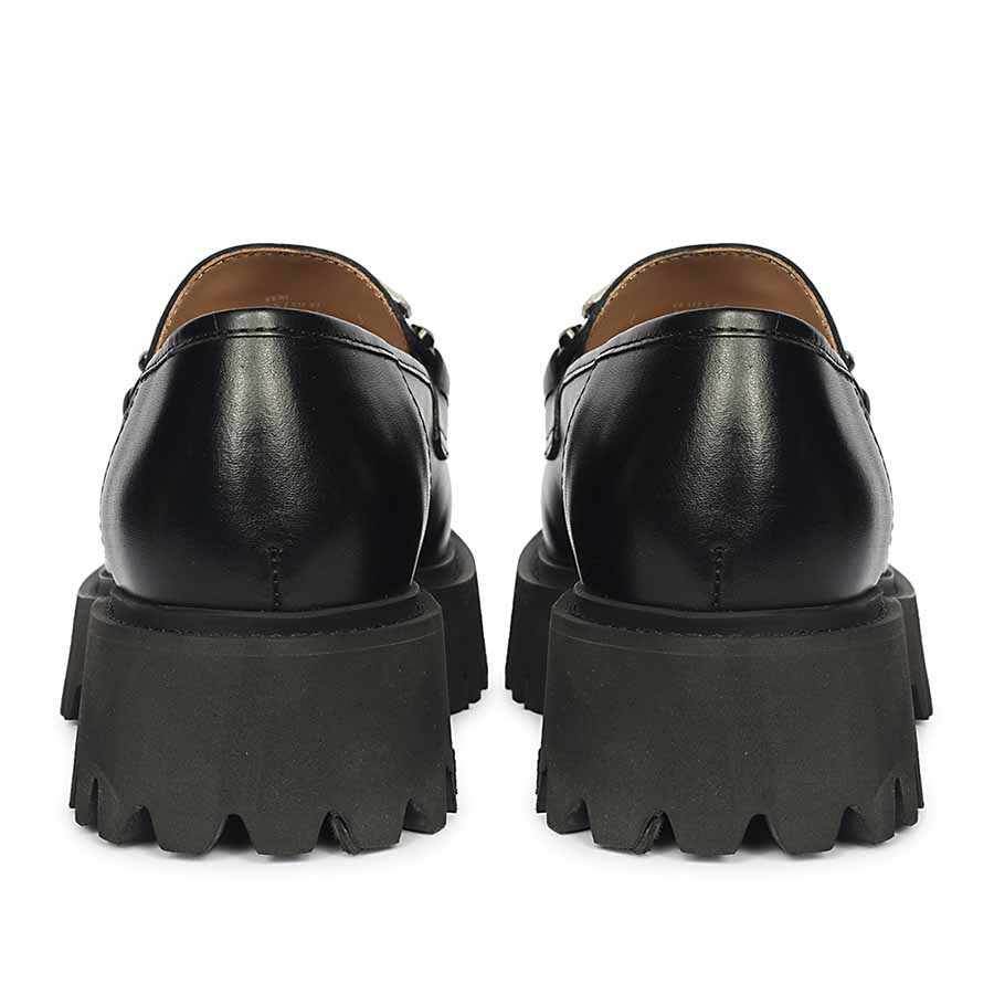 Best Ladies Saint Feri crystal saddle black leather moccasins, back pair view of lug sole — Women's shoes UK
