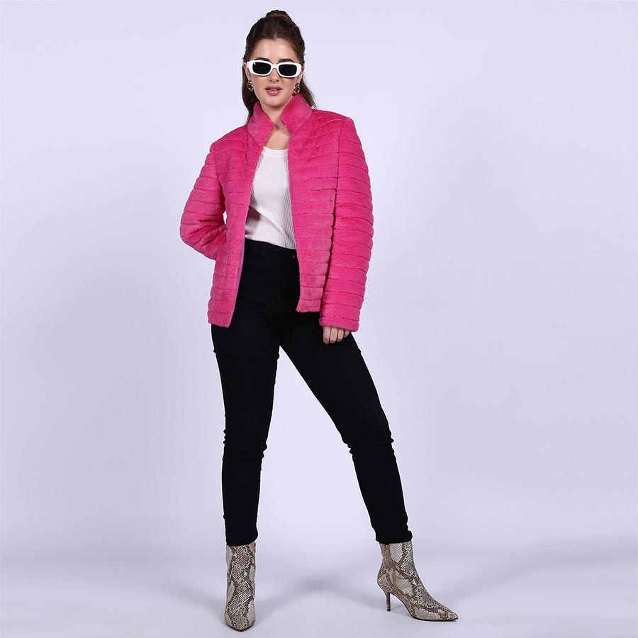 Women's pink fur jacket UK by Saint Fernanda, styled full-length lifestyle shot