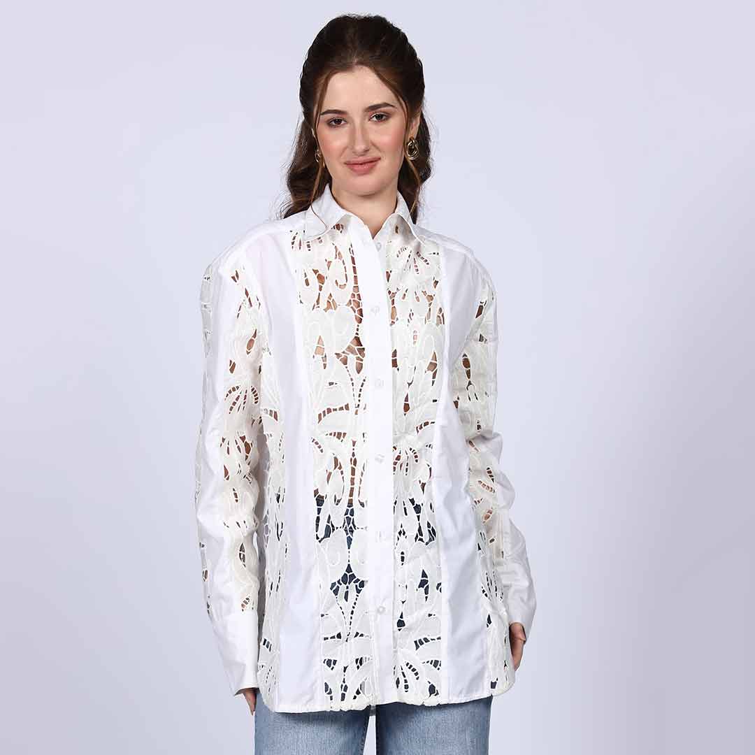 Women's white cutwork cotton shirt by Saint Fiora, three-quarter front view.