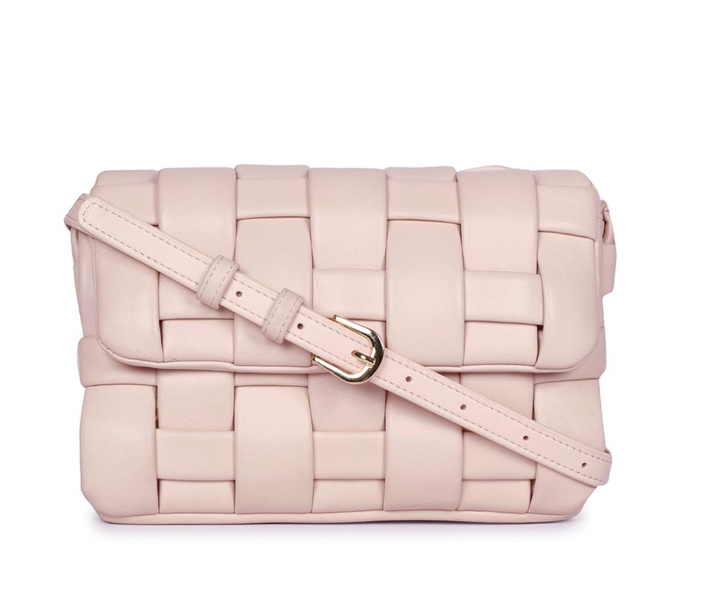 Saint Giada pink blush woven leather flap cross body bag for women UK, front view with buckle strap.
