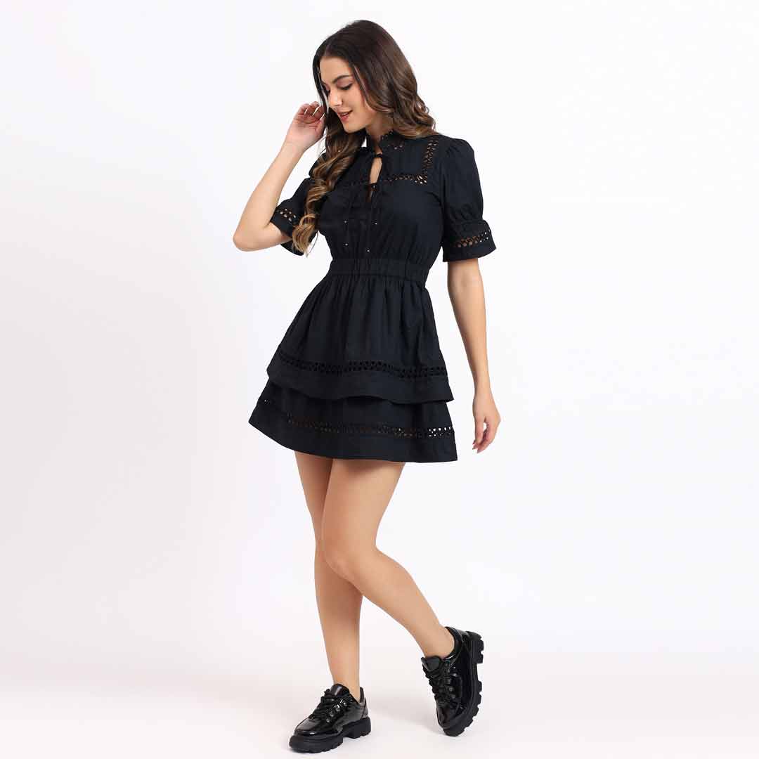 Saint Gianna black lace-trim tiered short dress for women UK, full front walking view.
