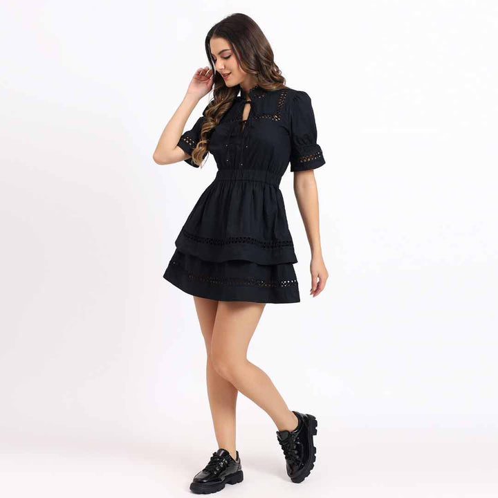 Saint Gianna black lace-trim tiered short dress for women UK, full front walking view.