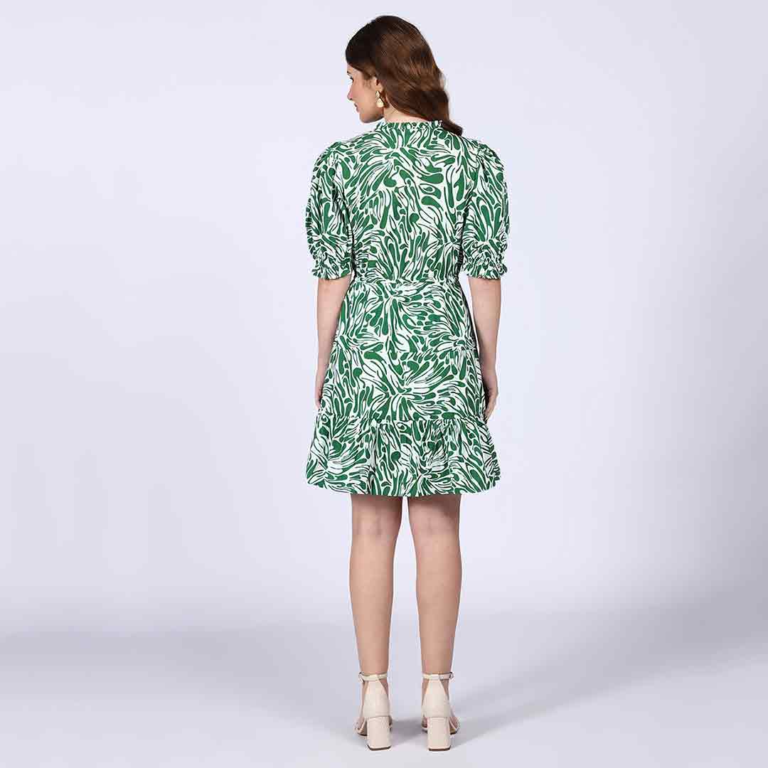 Women's green white leaf-print short dress for women UK, back view.