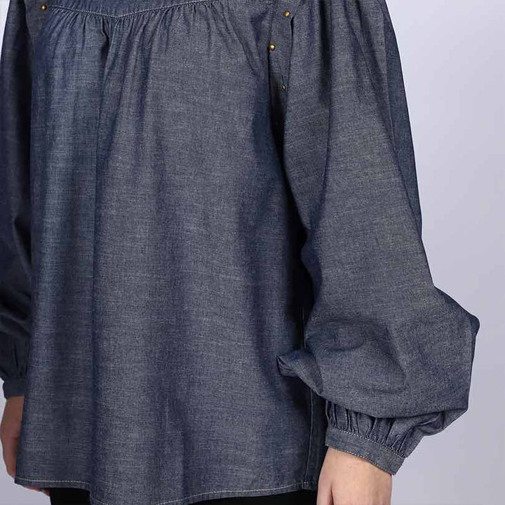 Close-up of gathered yoke and sleeve on Saint grey cotton chambray top for women UK.