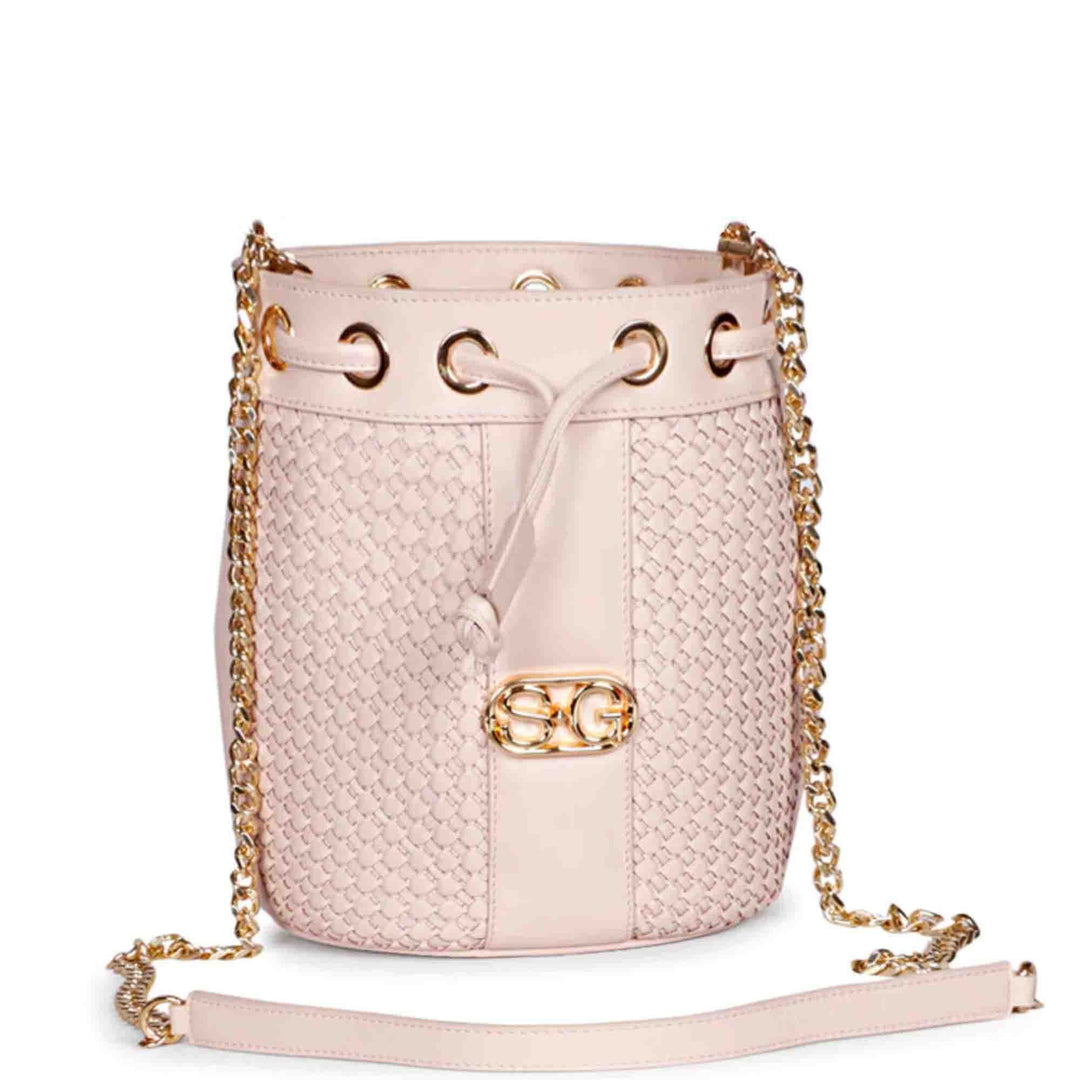 Saint Halsey pink blush hand-woven leather bucket bag for women UK, front view with drawstring top and chain strap.