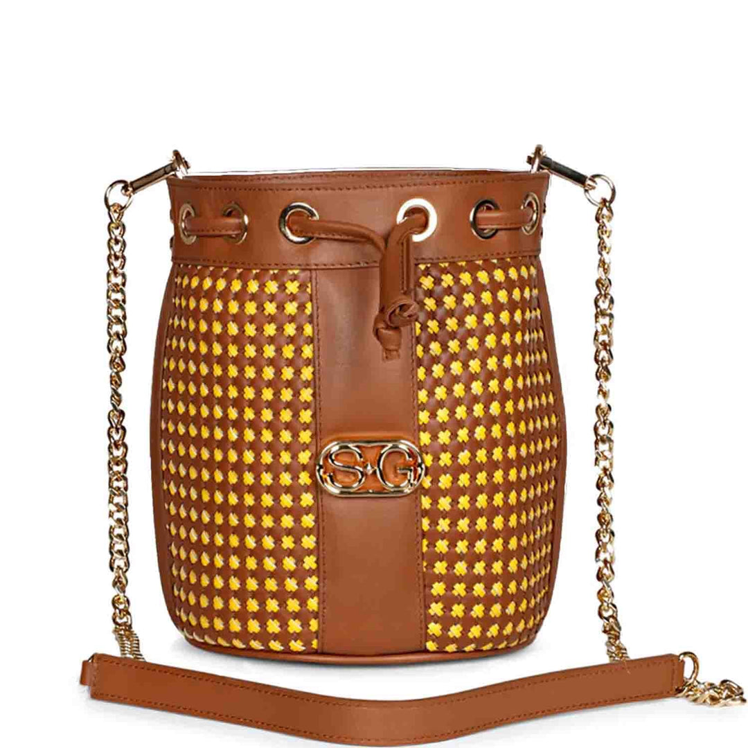 Saint Halsey tan and yellow hand-woven leather bucket bag for women UK, front view with drawstring top and chain strap.