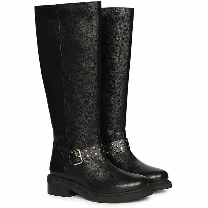 Black leather knee high boots for women UK, pair view showing studded harness strap