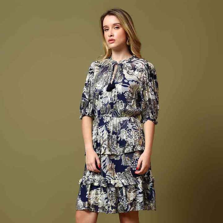 Women's navy tropical lurex mini dress by Saint Haydee, three-quarter front view.