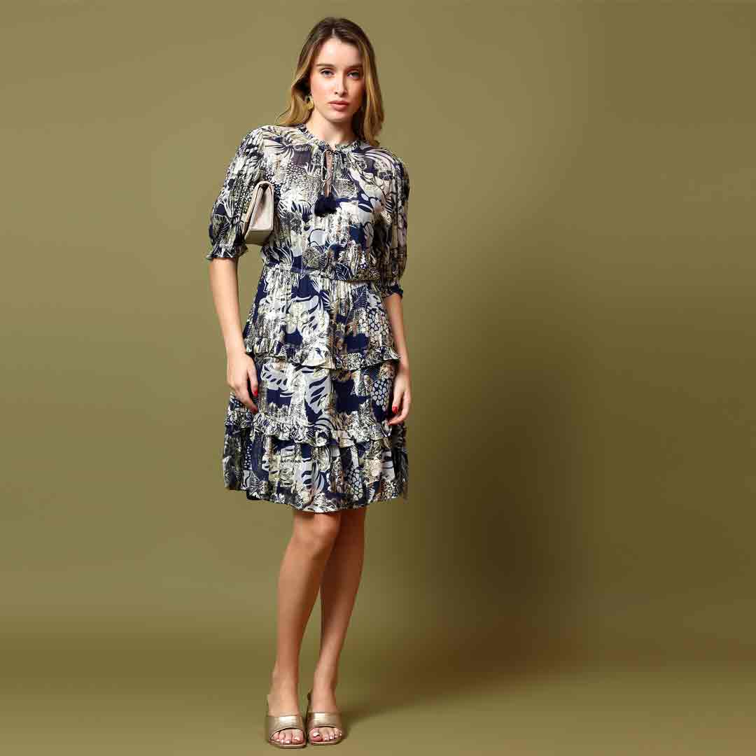 Saint Haydee navy tropical lurex mini dress for women UK, front view styled with a handbag.