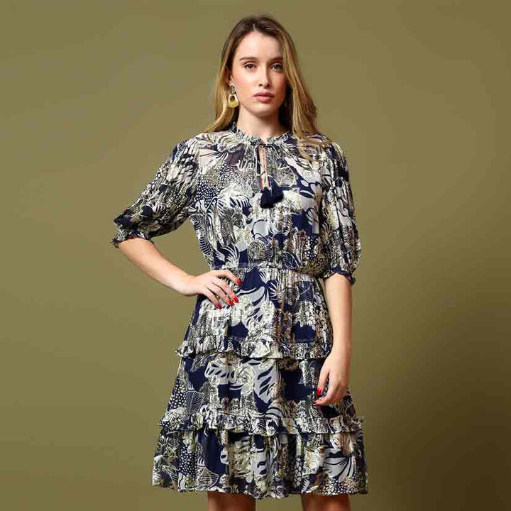 Saint Haydee navy tropical lurex mini dress for women UK, front view with tasselled tie-neck.