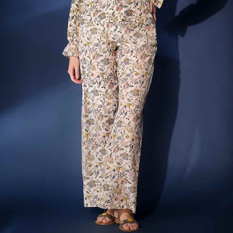 Close-up of wide-leg trouser and floral check dobby print on Saint Inaya co-ord set for women UK.