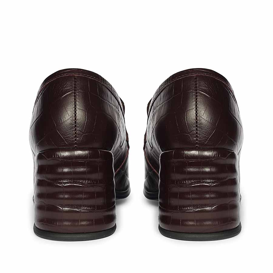 Women's dark cherry croc-embossed leather loafer pumps, back heel view, UK