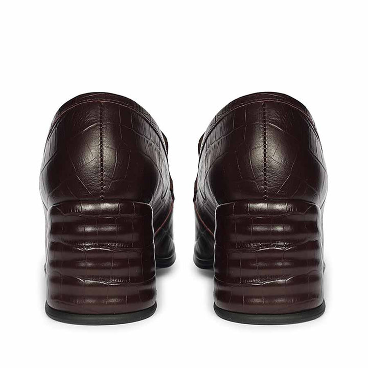 Women's dark cherry croc-embossed leather loafer pumps, back heel view, UK