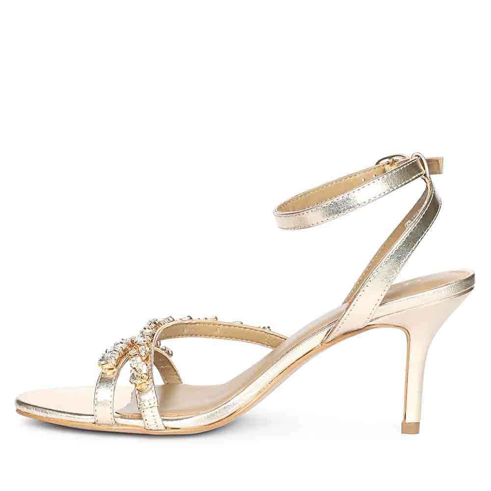 Women's Saint Isla Stone Embellished Champagne Leather Strappy Stilettos, angled view