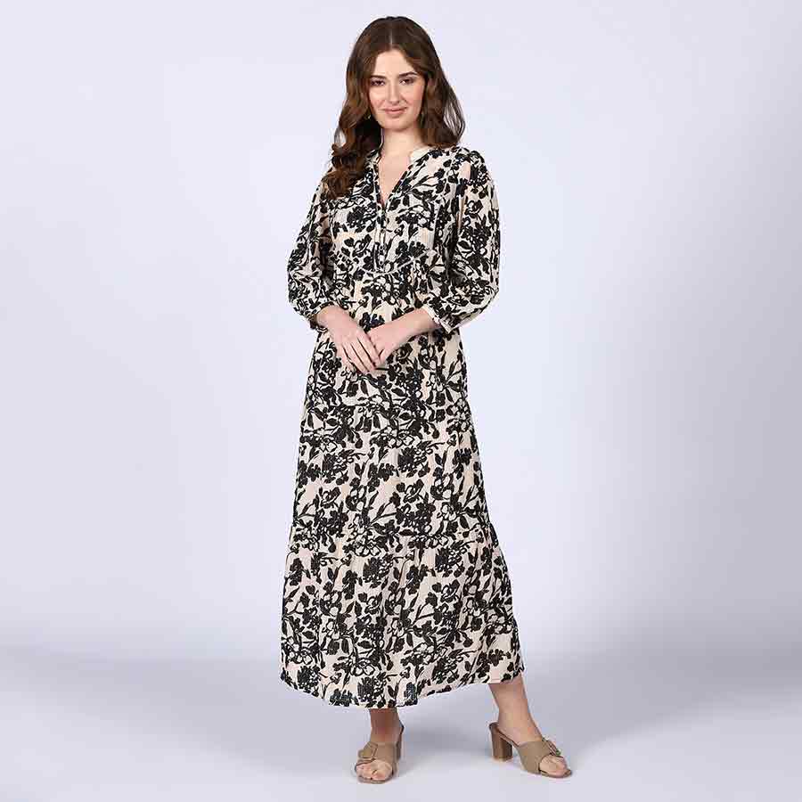 Women's ivory black floral viscose midi dress for women UK, front view with V-neck and tiered hem.
