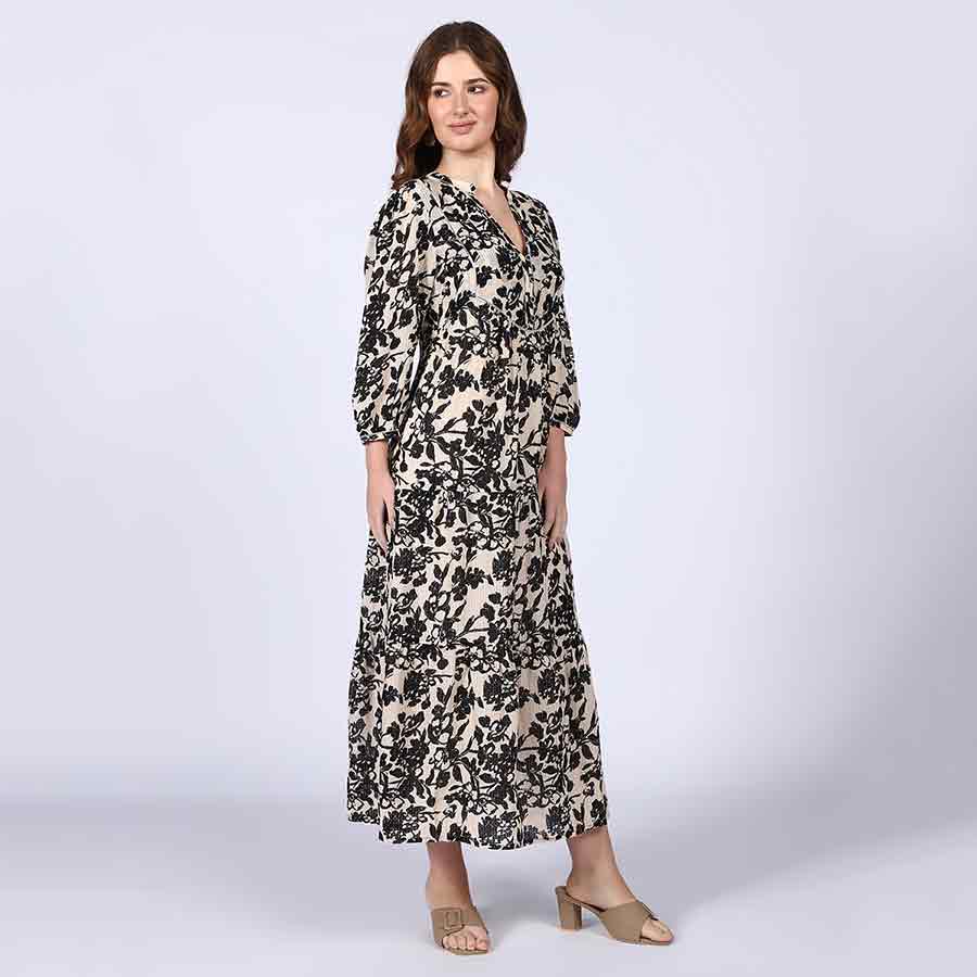 Women's ivory black floral viscose midi dress for women UK, side view showing ankle-length hem.