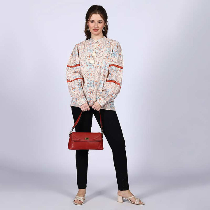 Women's ivory multicolour block-print top for women UK, front view styled with black trousers.