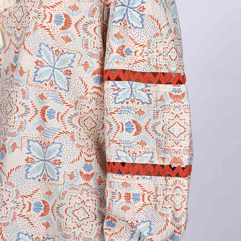 Close-up of zigzag trim and block print on Saint ivory multicolour top for women UK.