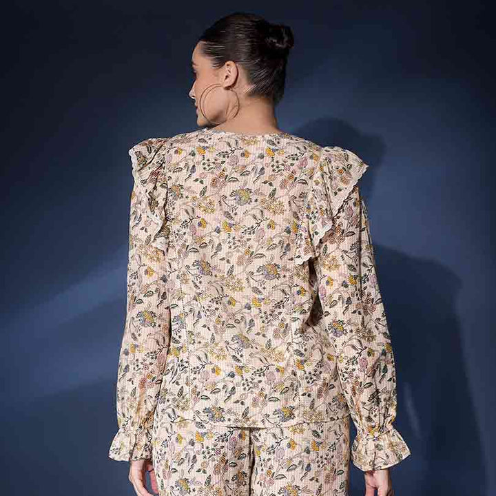 Women's ivory ruffle floral dobby top by Saint Jasmaria, back view.